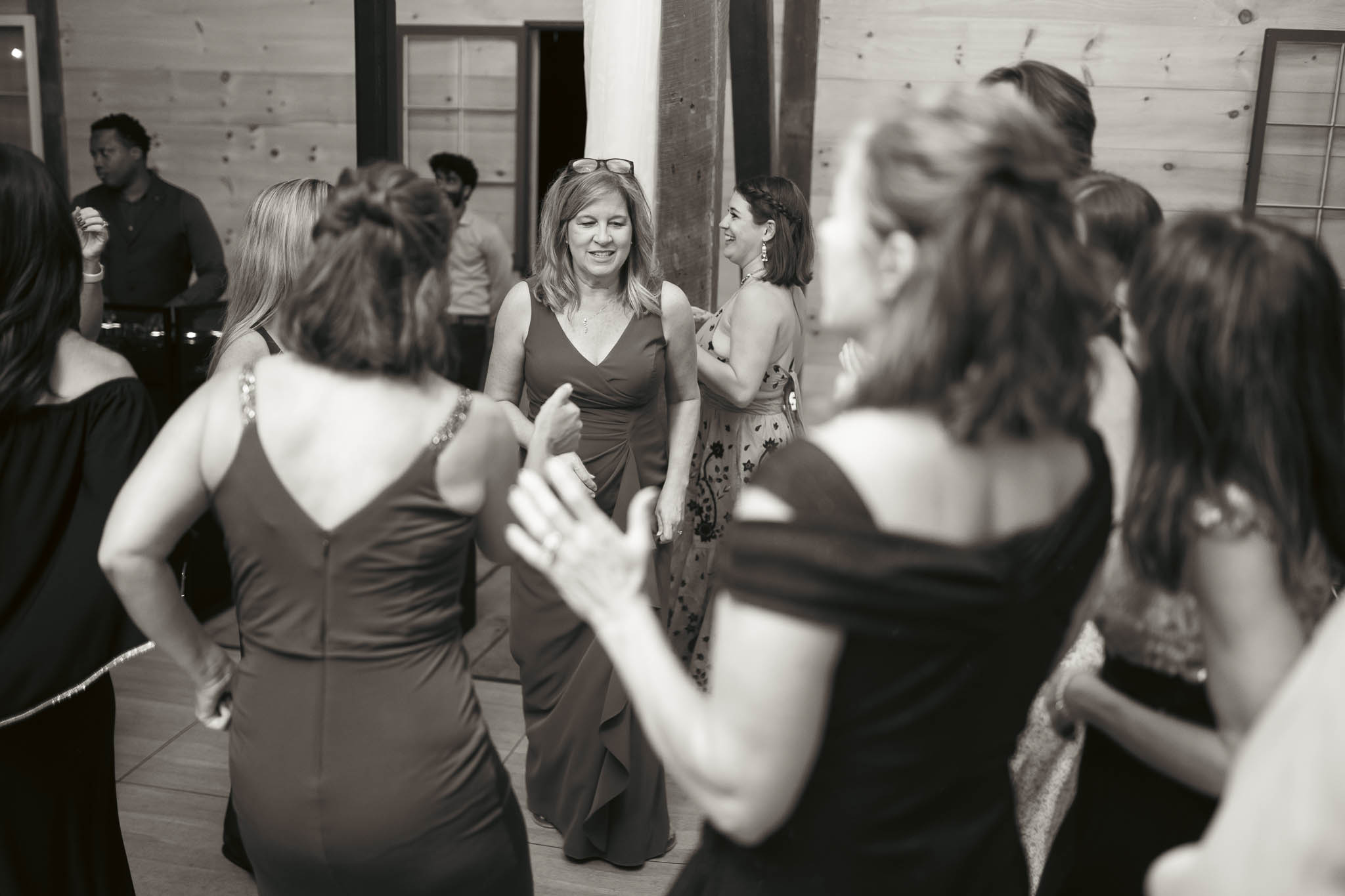 Late-night dancing under the draped barn ceiling — Sylvanside Farm wedding in Purcellville, Virginia