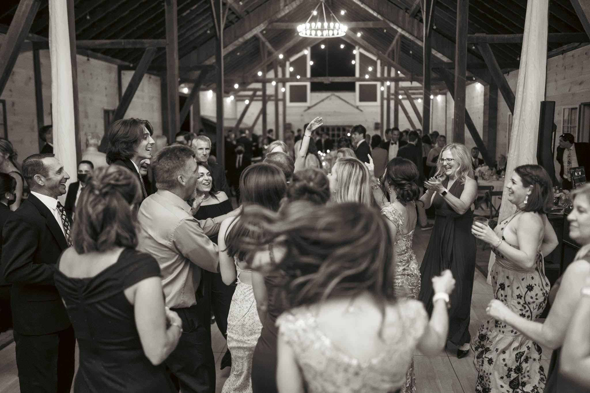 Guests dancing late into the night in the barn — Sylvanside Farm wedding in Purcellville, Virginia