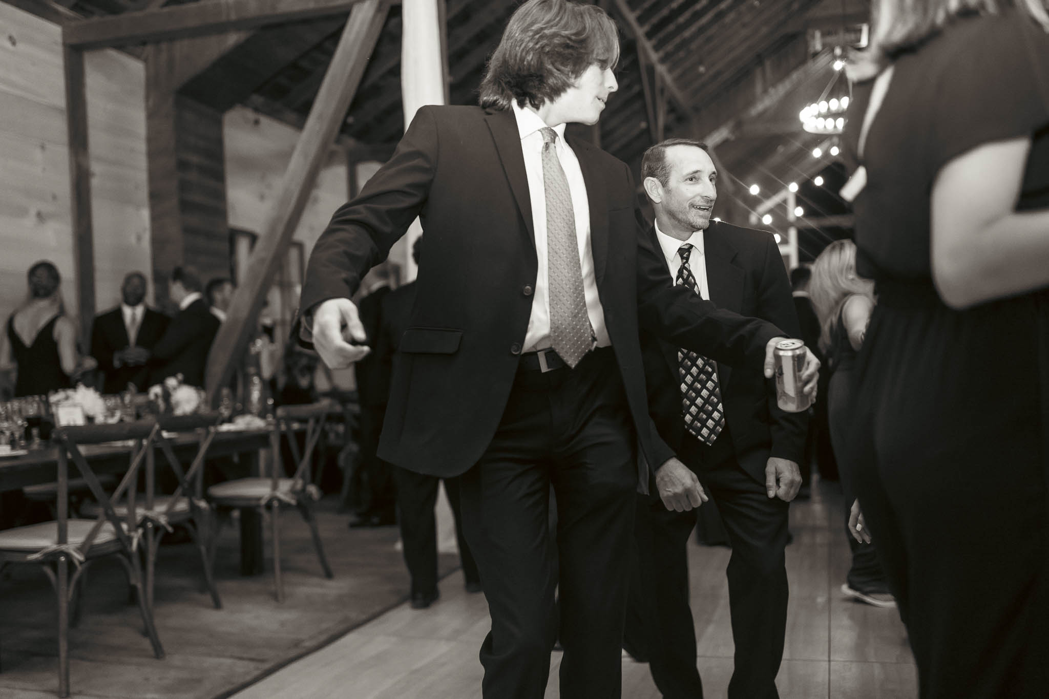 Guests dancing late into the night in the barn — Sylvanside Farm wedding in Purcellville, Virginia