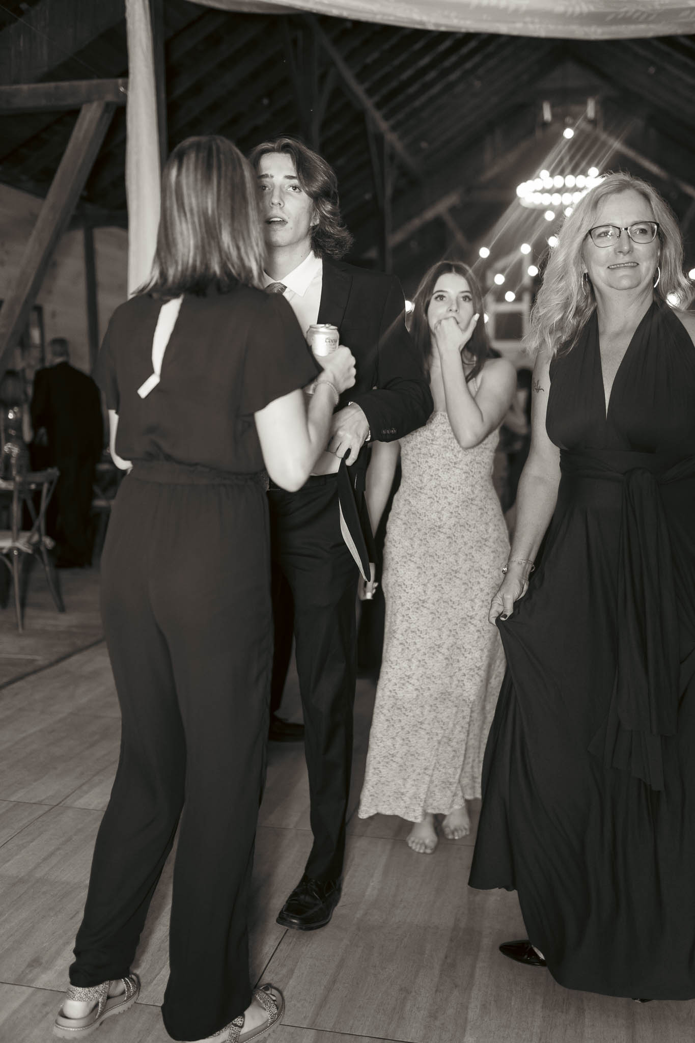 Guests filling the dance floor in the barn — Sylvanside Farm wedding in Purcellville, Virginia