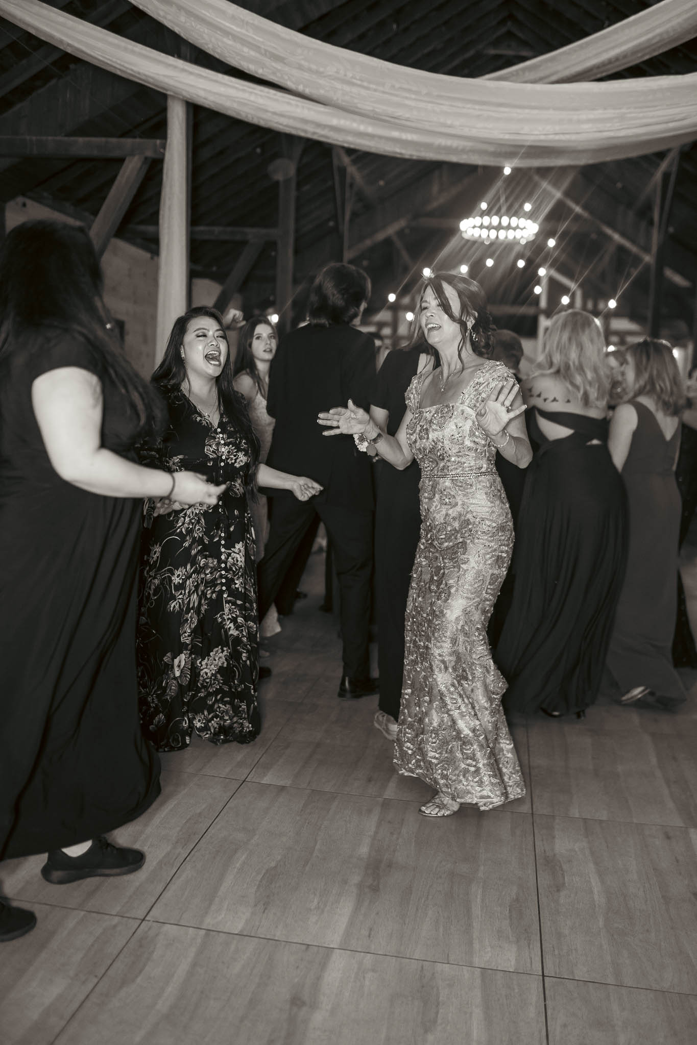Black and white dance floor photograph at the barn reception — Sylvanside Farm wedding in Purcellville, Virginia