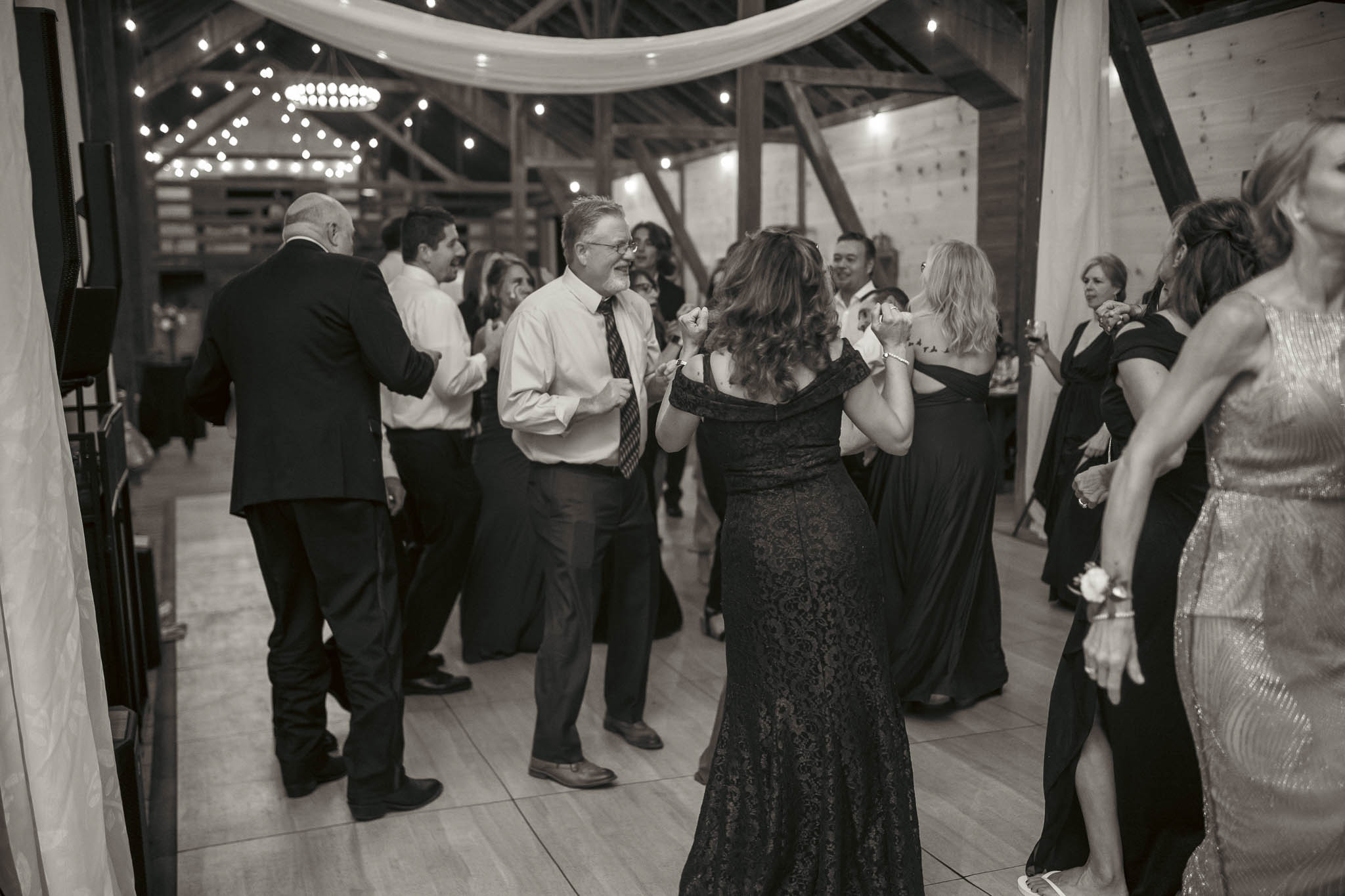 The dance floor in full swing at the barn reception — Sylvanside Farm wedding in Purcellville, Virginia